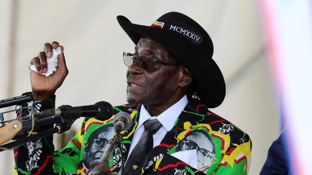 At 93rd birthday bash, Robert Mugabe says he won't quit The world's oldest leader said he has no plans to step down in his lavish birthday party.