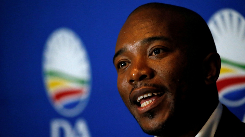 Maimane says he was denied entry to the country over his support for a Zambian opposition leader charged with treason.