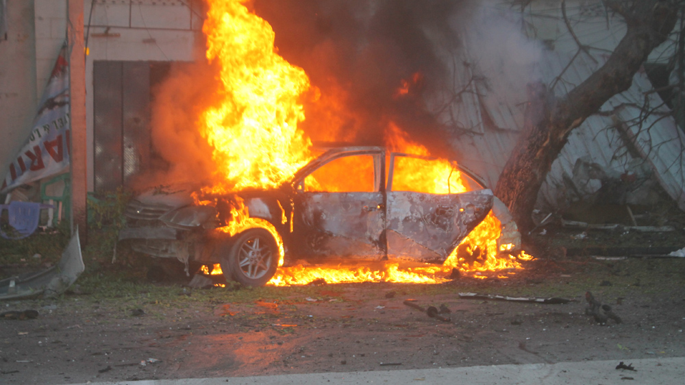 At least five killed, 20 wounded after huge car bomb goes off near the immigration directorate in the capital.