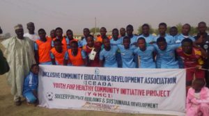 Team members of Danmaliki United and Baraya United shortly after a Y4HCI football match in Bunkure community of the state of Kano