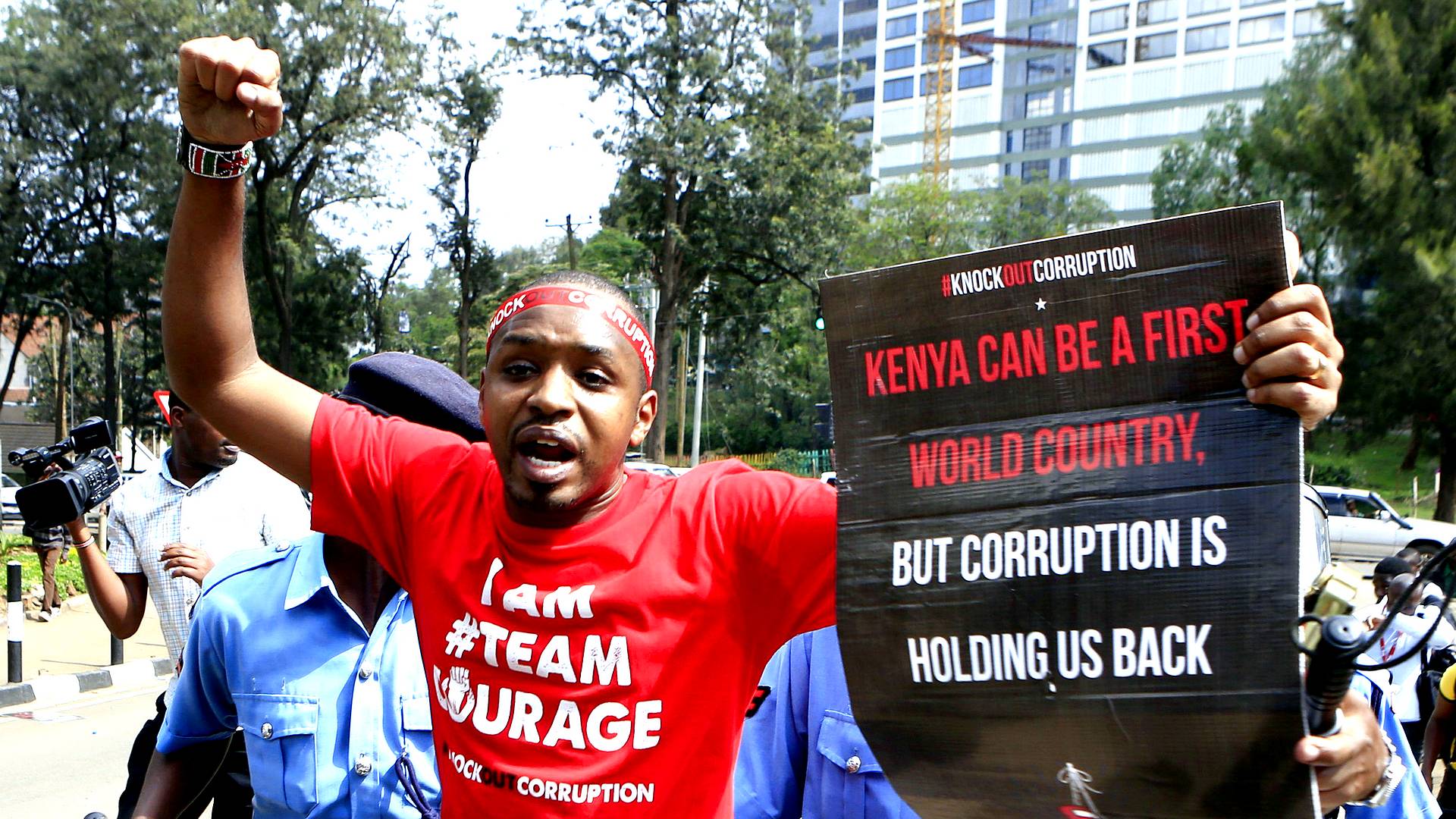 Murder of election chief casts shadow over next week's elections as many Kenyans take to streets to demand justice.